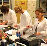 students in nursing program engage in lab activities together