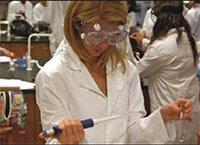 Student in lab for nursing program