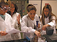 another group of students join together to complete lab tests