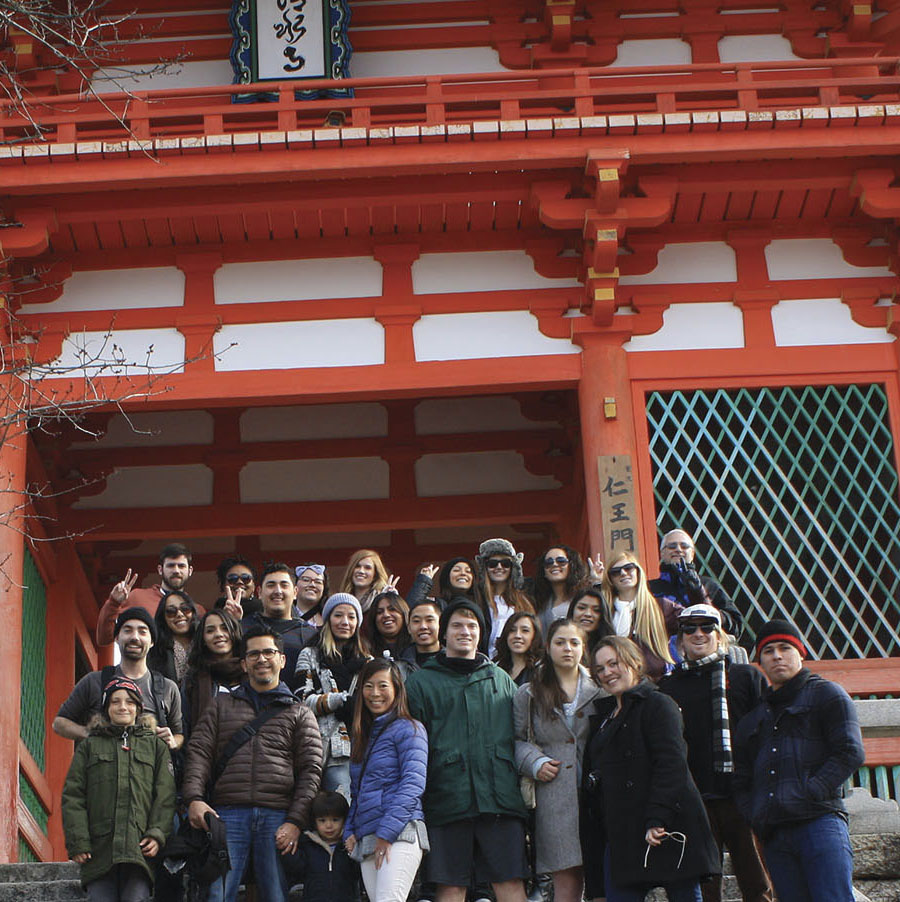 CSUCI students studying abroad stand in front of a temple in Kyoto, Japan.