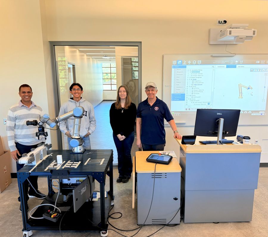 Computer Science students with universal robots