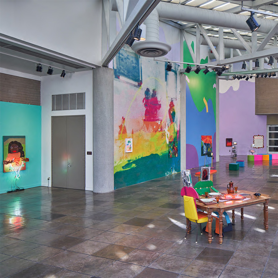 The photo shows the colorful interior of the California African American Museum.