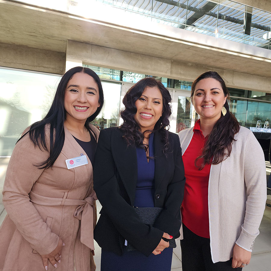 Alumni & Friends Association Board President Brenda Bravo, alumna Kiki Reyes and Director of Career Development & Alumni Engagement Amanda Carpenter