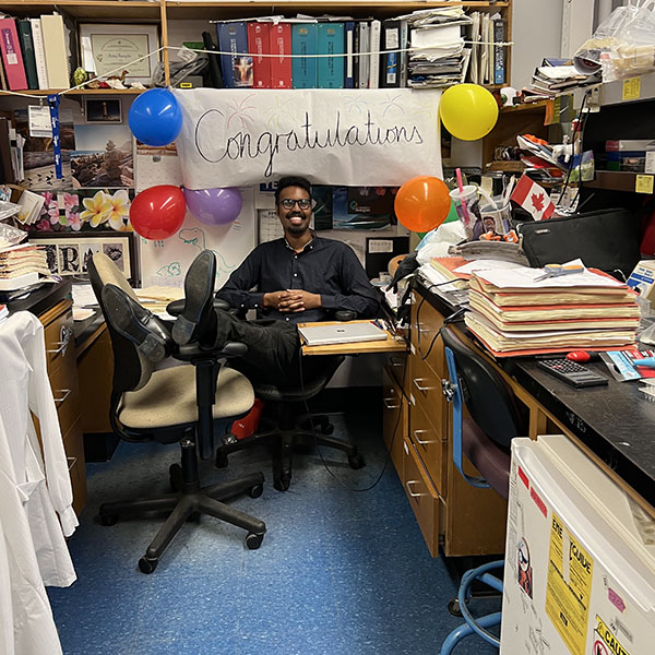 Mohamed Faynus sits in his office at UCSB