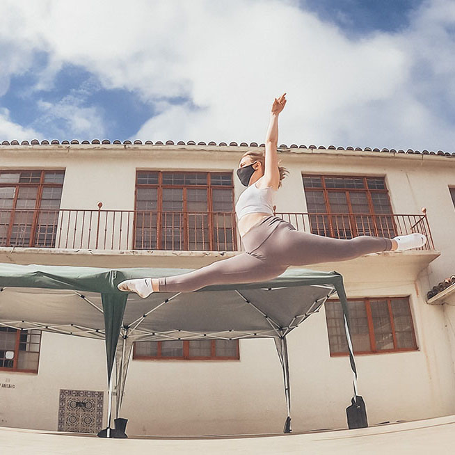 dancer outside leaping in air