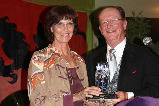 President Rush presenting Award to Patricia Richards-Dodds