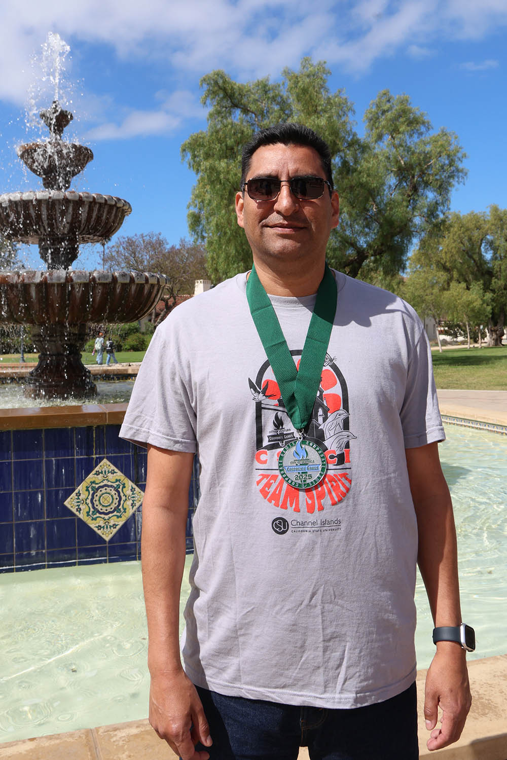 Photo of Anthony Plescencia wearing a silver medal