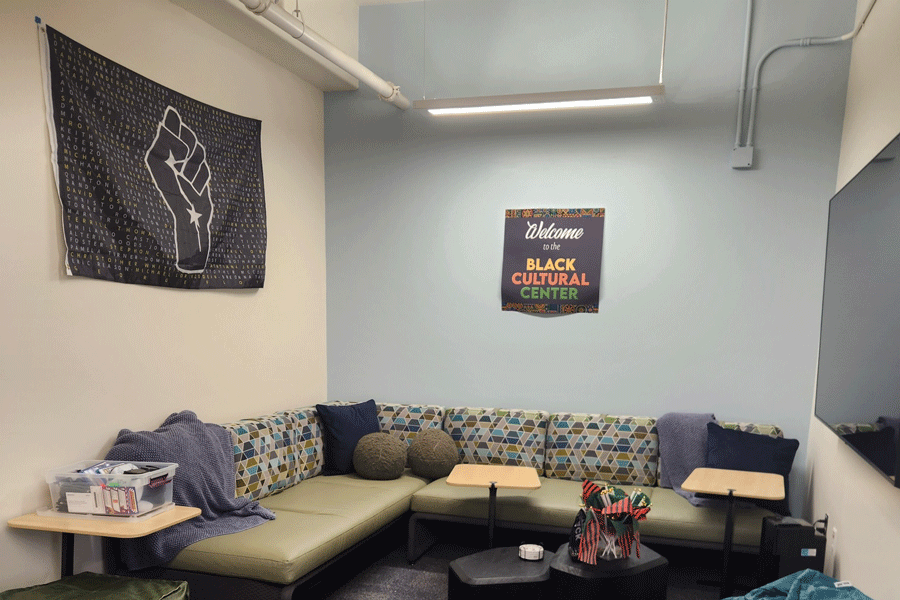 Room with TV, a couch, and a banner that says "Welcome to the Black Cultural Center"
