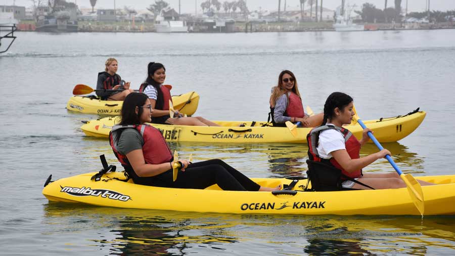 students kayaking
