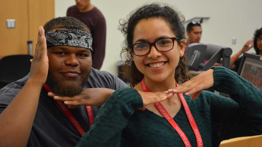 two students posing for the camera