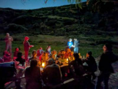 students at table at night