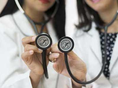 Two doctors with stethoscope